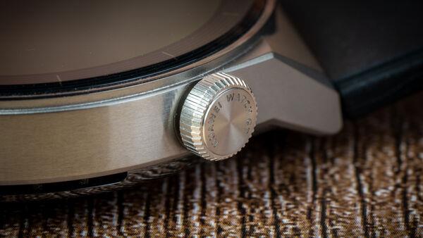 The titanium dial is beautifully crafted with the writing 