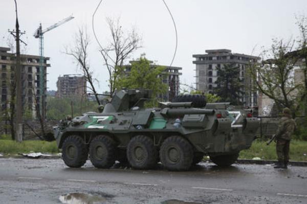 An APC of Do<em></em>netsk People's Republic militia stands not far from Mariupol's besieged Azovstal steel plant in Mariupol. Picture: AP Photo