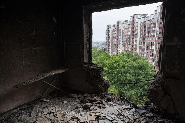 Debris cover the room of an apartment damaged during shelling in Kharkiv, eastern Ukraine. Picture: AP Photo/Bernat Armangue