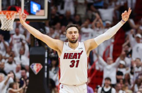  Max Strus #31 of the Miami Heat celebrates a three pointer against the Philadelphia 76ers
(Photo by Michael Reaves/Getty Images)
