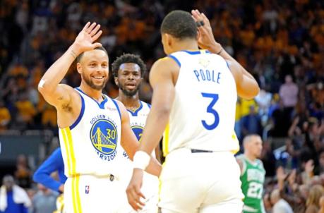 Jun 5, 2022; San Francisco, California, USA; Golden State Warriors guard Stephen Curry (30) celebrates with guard Jordan Poole (3) during the fourth quarter against the Boston Celtics during game two of the 2022 NBA Finals at Chase Center. Mandatory Credit: Kyle Terada-USA TODAY Sports